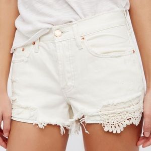 Free people white distressed shorts
